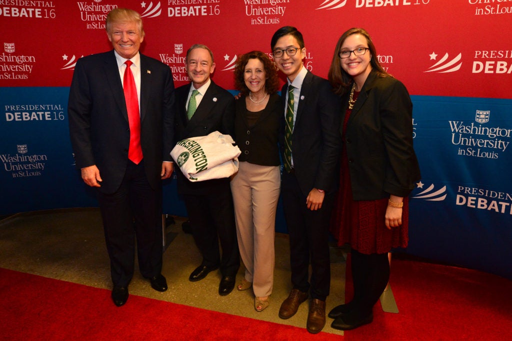 From right: Graduate Professional Council President Haley Dolosic, Student Union President Kenneth Sng, Risa Zwerling and Chancellor Mark S. Wrighton greet presidential candidate Donald Trump before the 2016 presidential debate at Washington University. (Photo: Joe Angeles/Washington University)