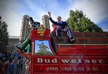 Chancellor Wrighton gets his first-ever ride in the iconic Clydesdale hitch.