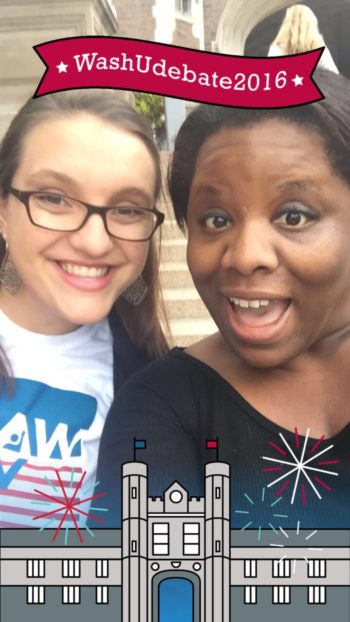 Sigaran (right) demonstrates a debate geofilter with Haley Dolosic, president of the Graduate Professional Council and co-chair of the Student Engagement in Presidential Debate Committee.