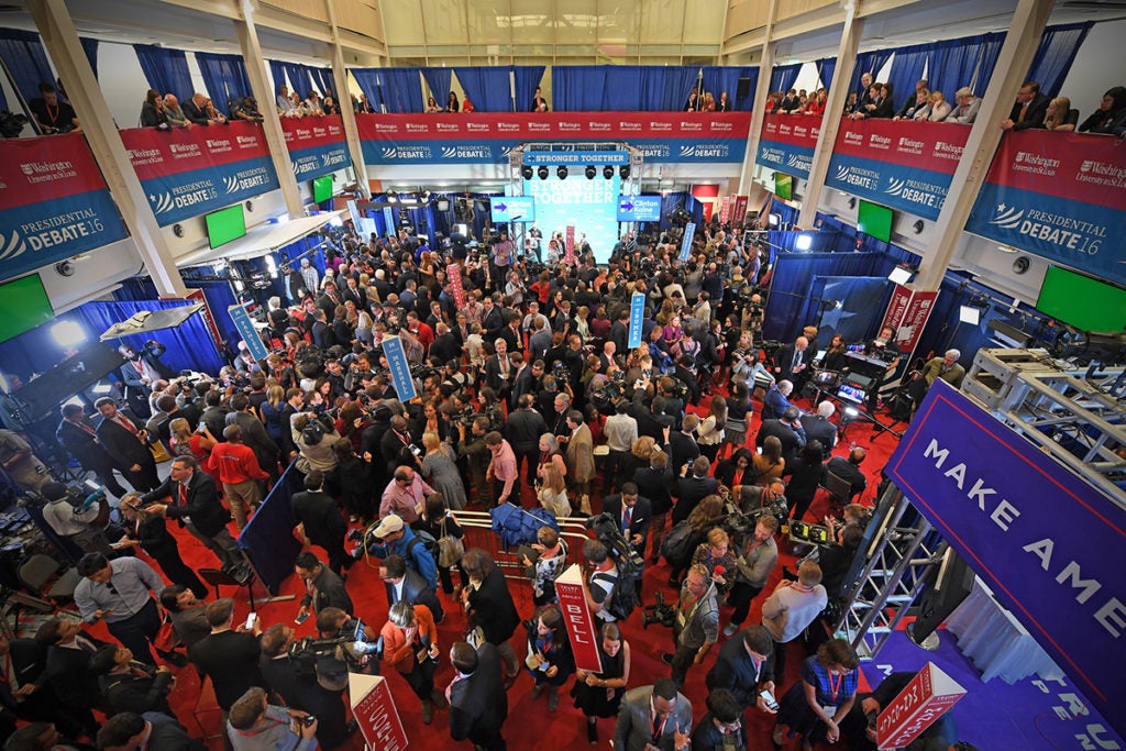 journalists crowd Spin Alley