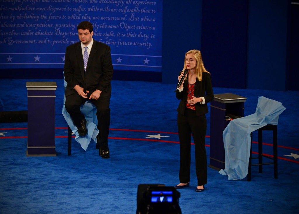 Daniel Meyerson (left) and Caroline Niesen do their best imitations of Donald Trump and Hillary Clinton.